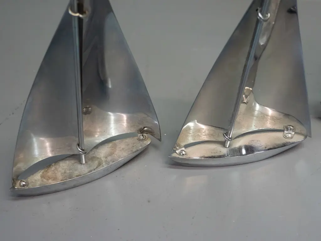 4 ornamental chrome yachts - largest one has some corrosion at base of mast H-360 L-180 Image 1++