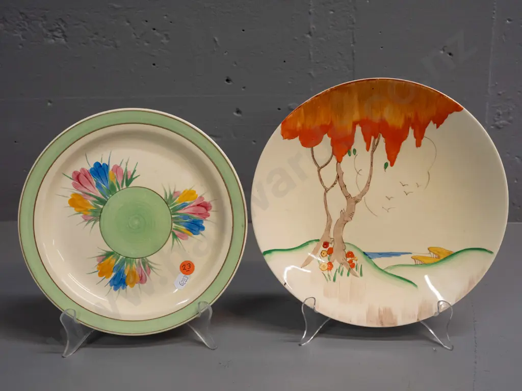 2 Clarice Cliff plates - Newport Pottery crocus design and Wilkinson tree pattern with some slight staining D-230 Image 1++