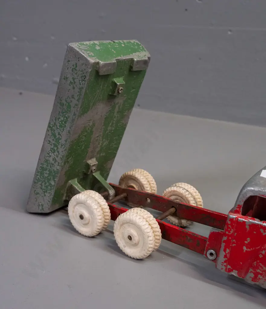 Fun Ho cast metal tip truck with white wheels, marked No. 502 on underside of tray. Paint wear and one door dented Image 1++