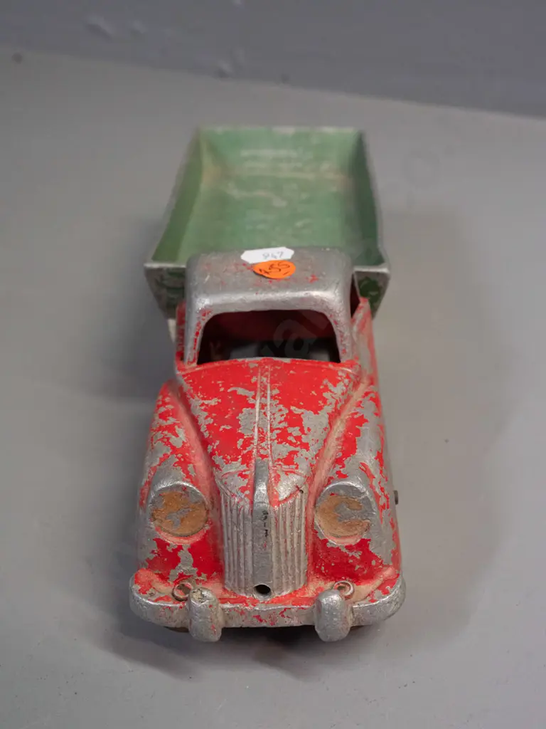 Fun Ho cast metal tip truck with white wheels, marked No. 502 on underside of tray. Paint wear and one door dented Image 1++