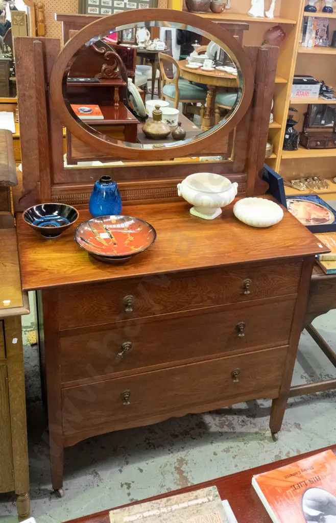 vintage oak mirror-back dresser with oval bevelled-edge mirror, press-carved panel, 3 drawers with drop handles, on Image 1++