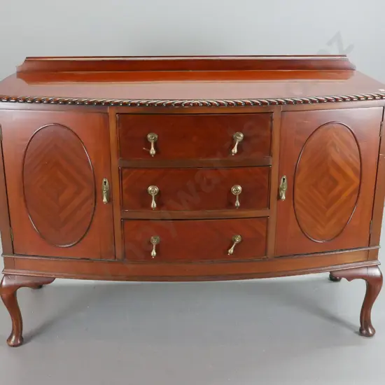 Victorian walnut carved-back chiffonier with carved crest on shaped back, 2 drawers with pierced brass handles, 2