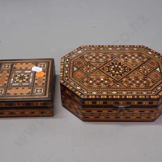 2 inlaid timber lidded boxes - mixed timber, mother of pearl, bone? larger has inlay inside lid as well H-55 W-180 D-130