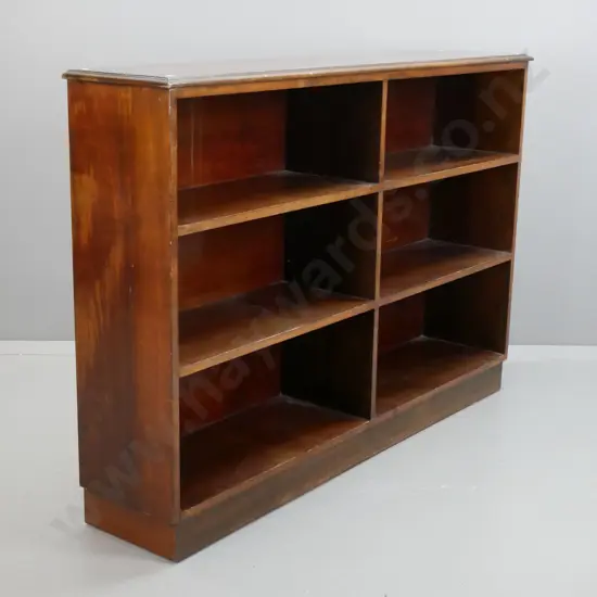 beech open-shelf bookcase with centre partition, 2 shelves either side, on plinth base - some scratching to surfaces,