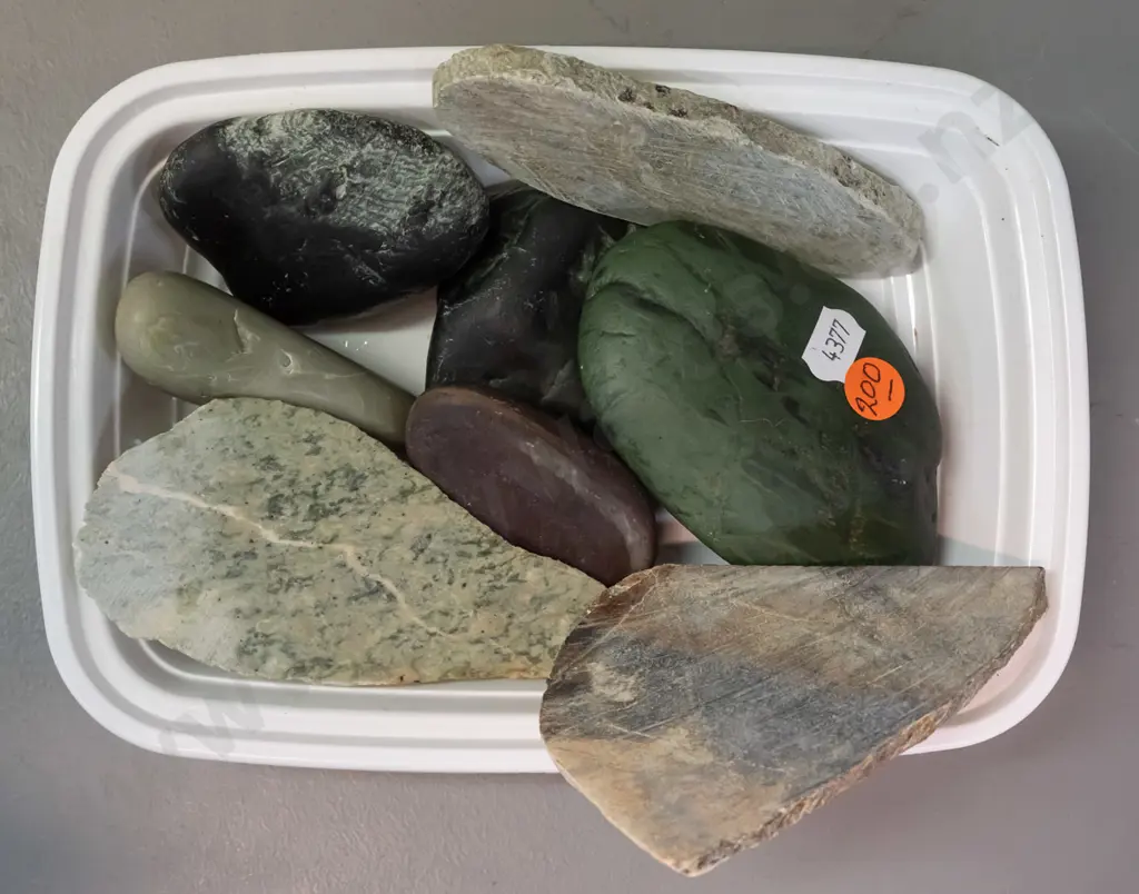 8 pieces of stone, some cut, all were marked greenstone - large dark green piece L-150 Image 1++
