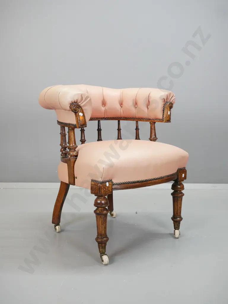 Victorian oak tub chair with turned spindles, turned & fluted legs on porcelain casters, pleated and buttoned leather Image 1++