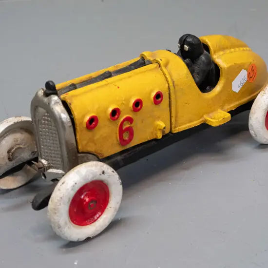 reproduction 1930s style cast iron racer with opening engine compartment. H-95 L-245