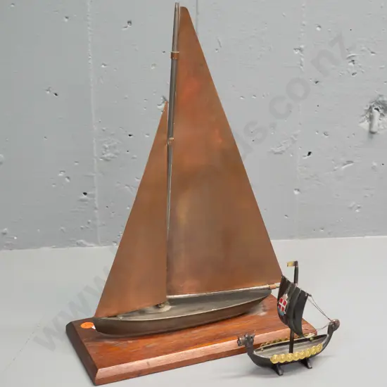 ornamental copper and cast metal yacht on oak base H-350 Base L-240 and a small Danish viking boat