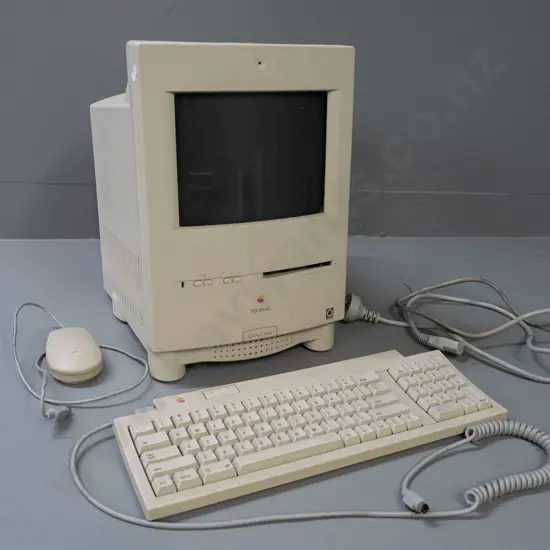 Apple Macintosh Color Classic computer circa 1993 with keyboard and mouse not working H-375 W-250 D-330