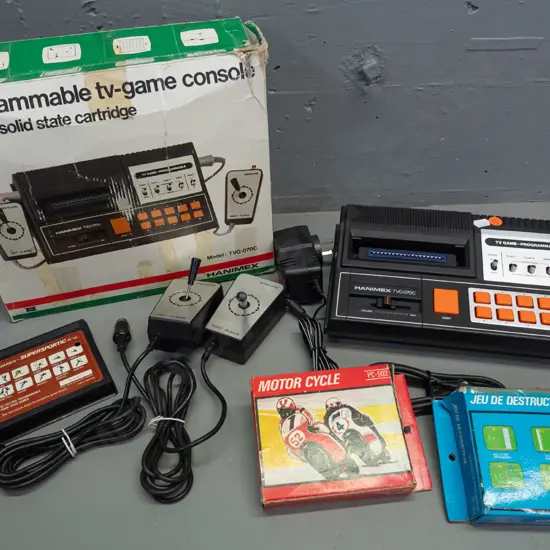 1980s Hanimex TVG070C video game console with 2 controllers, 3 games, 2 in boxes, with very worn original box - untested