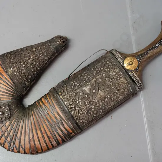ornate Jambiya / dagger from Sadaa Yemen with horn handle w/white metal and brass disc decoration, leather sheath w/