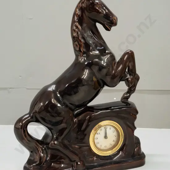 ceramic rearing horse mantel clock - a few glaze faults along front edge, some discolouration and