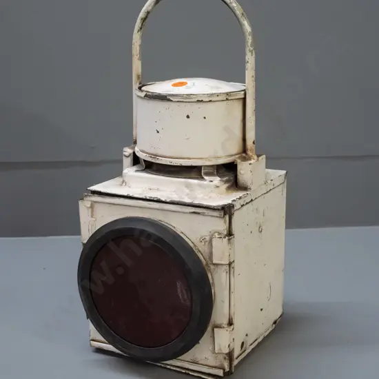 white painted metal railway signal lantern with red (perspex?) lens, burner with ceramic wick holder, fixed top handle,