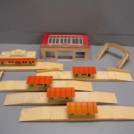 Hornby Dublo cast metal train station, station platforms and overbridge & a plastic Dinky garage - chips and minor wear