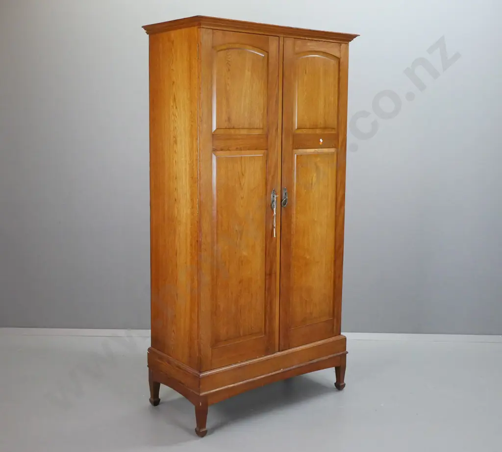 vintage 2-door wardrobe with shelf and clothes rail, arched panelled doors, lockable, with key, has added shelf supports Image 1++