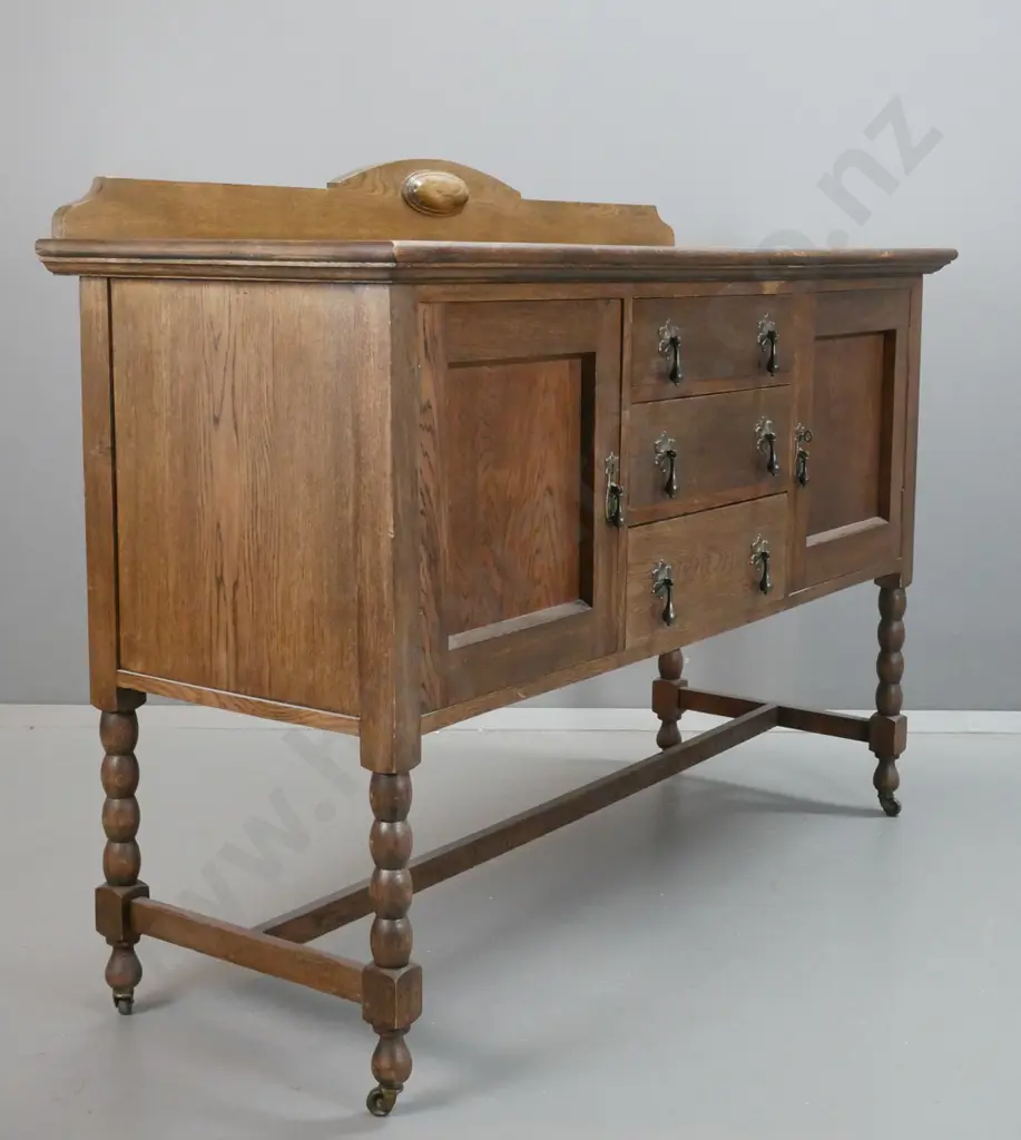 deco style oak 3-drawer 2-door sideboard with shaped upstand, on bobbin turned legs & stretcher base, drawers lined, Image 1++