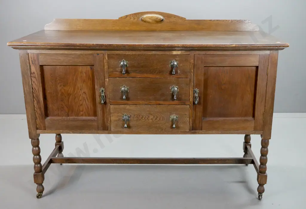 deco style oak 3-drawer 2-door sideboard with shaped upstand, on bobbin turned legs & stretcher base, drawers lined, Image 1++