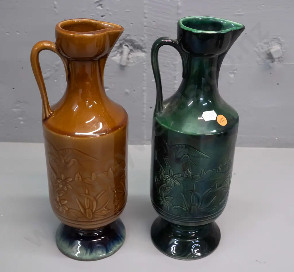 2 NZ ceramic handled ewer vases with heron motif designs - one marked Orzel and one Aquila Ceramics NZ H-310 Image 1++