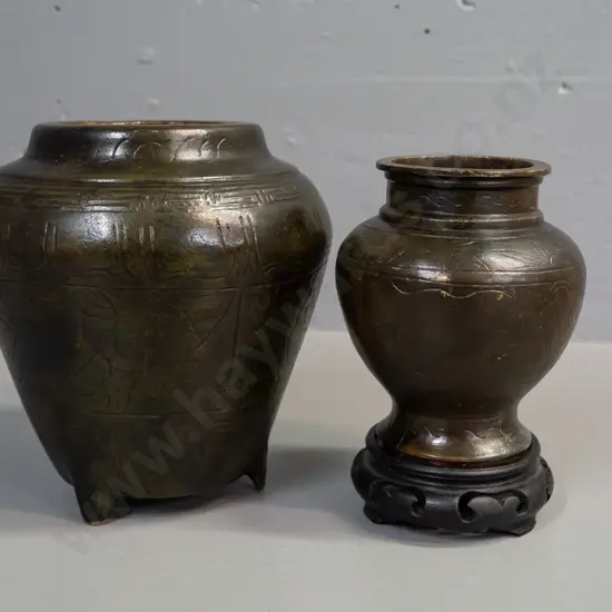 2 Chinese reproduction antique style cast brass or bronze temple jars, larger is 3-footed H-180, smaller w/ wooden stand