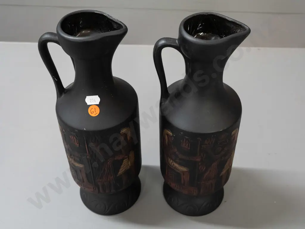 pair of Aquila Ceramics NZ handled ewer jugs with matte glaze, Egyptian motifs - one has small chip to base, some Image 1++