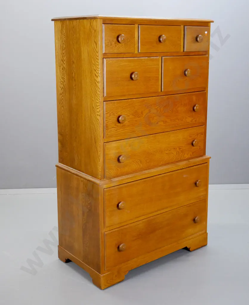 reproduction oak 9-drawer chest-on-chest with turned timber knobs, on bracket feet. H-1530 W-900 D-490 Image 1++