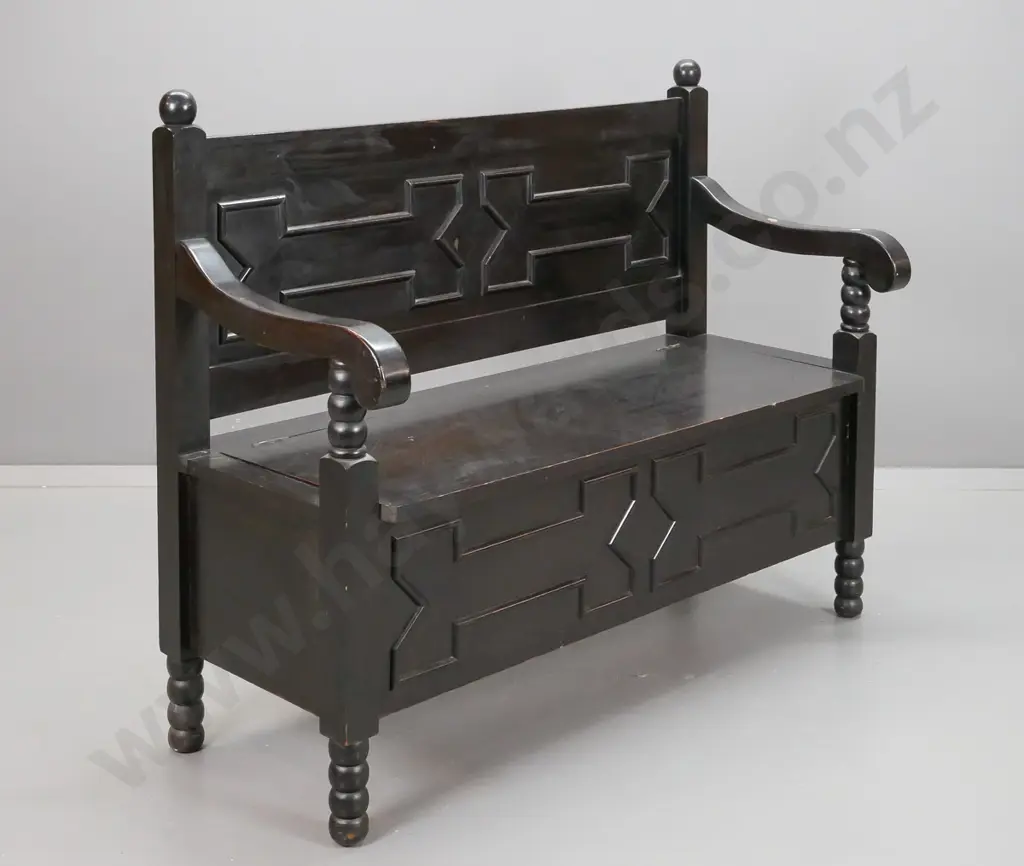 vintage dark stained Jacobean style settle w/ panelled back and lift-up seat, sweeping arms, bobbin turned supports and Image 1++