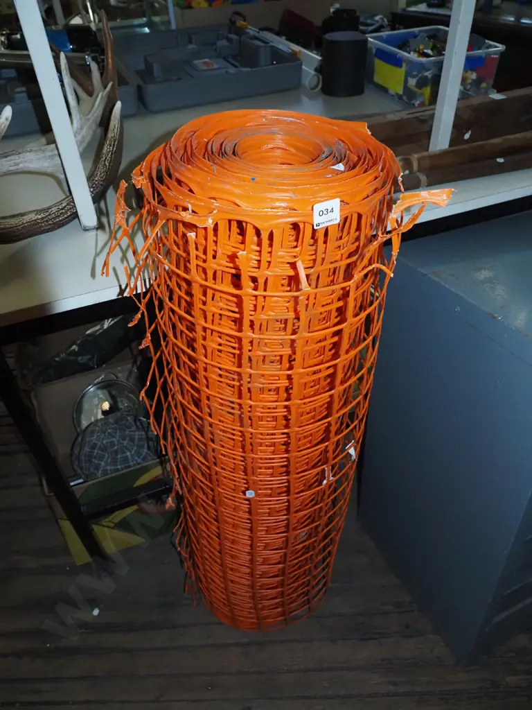 roll of orange plastic netting Image 1++