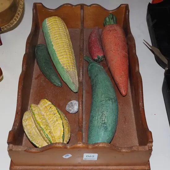 wooden cutlery tray with ceramic vegetables