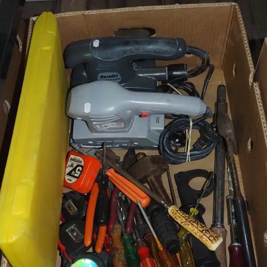 box of tools; screwdrivers, hatchet, sanders etc