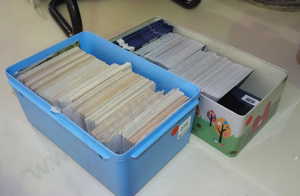 2x containers of collector cards - red dots Image 1++