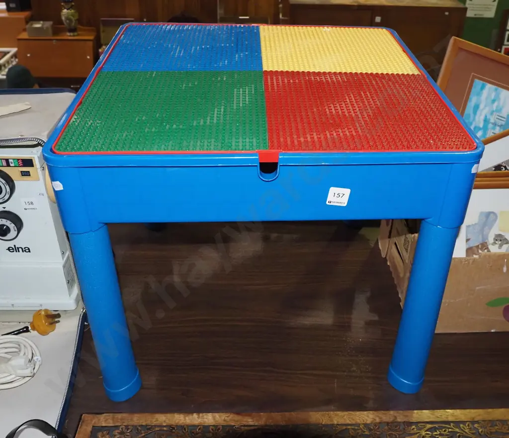 plastic child's table with Lego boards and internal storage Image 1++