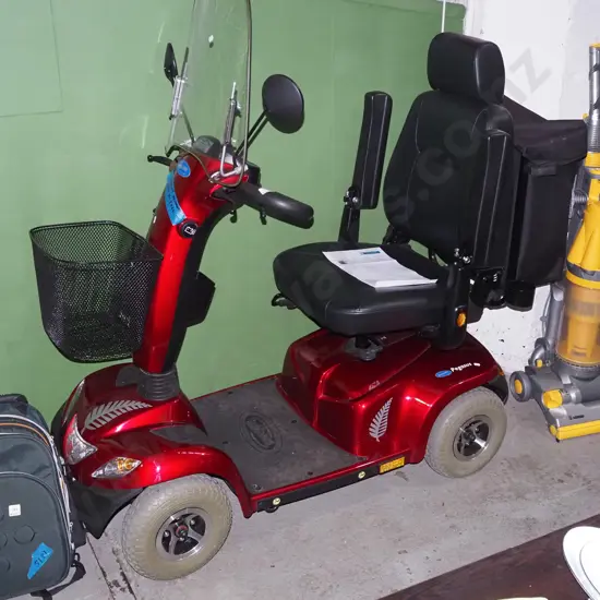 Invacare mobility scooter with front and back baskets and charger - batteries changed 2023/24