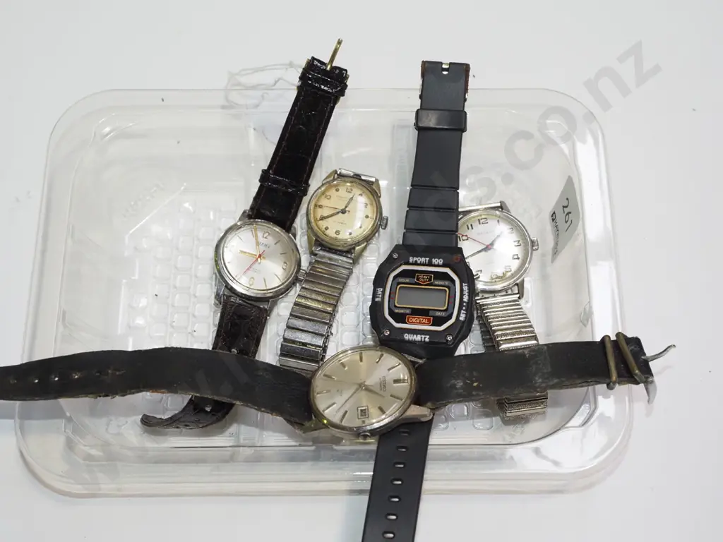 tray of wristwatches Image 1++