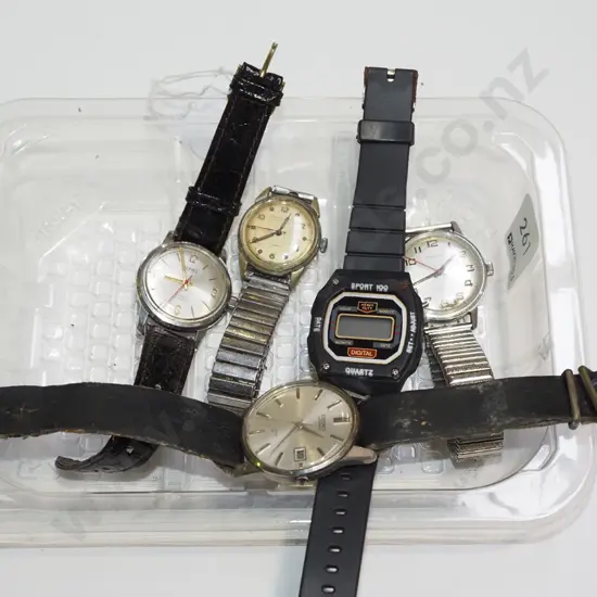 tray of wristwatches