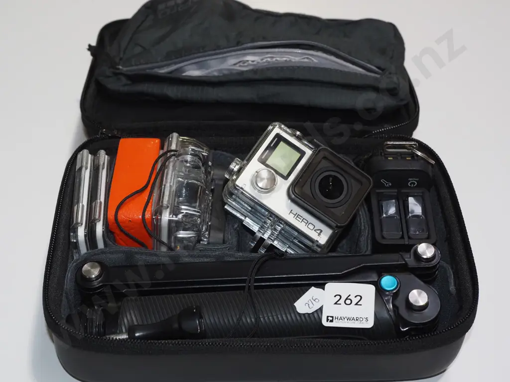 go-pro hero 4 in case with accessories Image 1++
