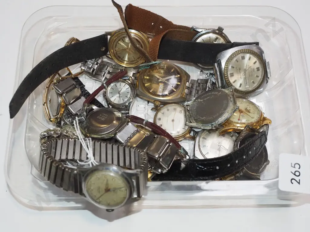 tray of wristwatches Image 1++