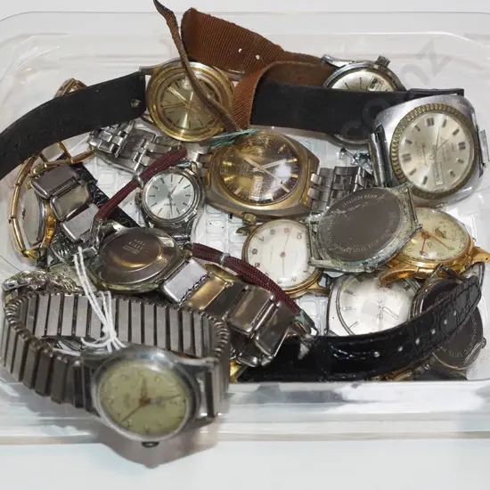 tray of wristwatches
