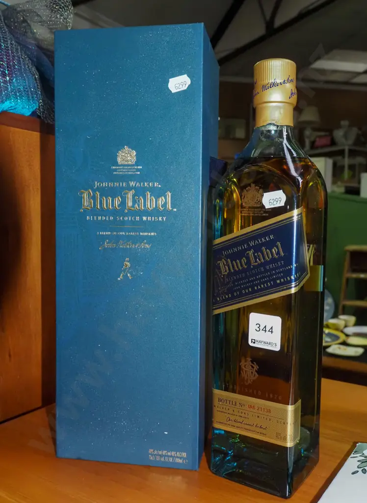 750ml bottle of Johnnie Walker blue label whisky Image 1++