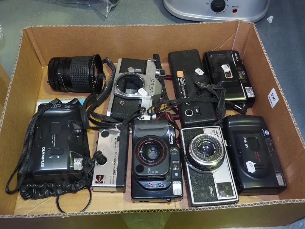 box; 35mm cameras and accessories Image 1++