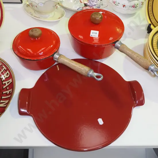 cast iron and enamel pots, circular pizza stone