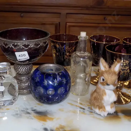 purple and gold glass goblets scent bottles, rabbit figurine etc