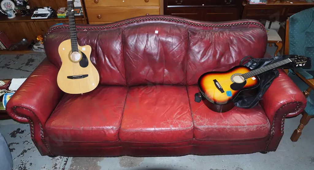 red leather rolled arm 3 seater settee with heavy dome studs - significant wear and tears to leather  Image 1++