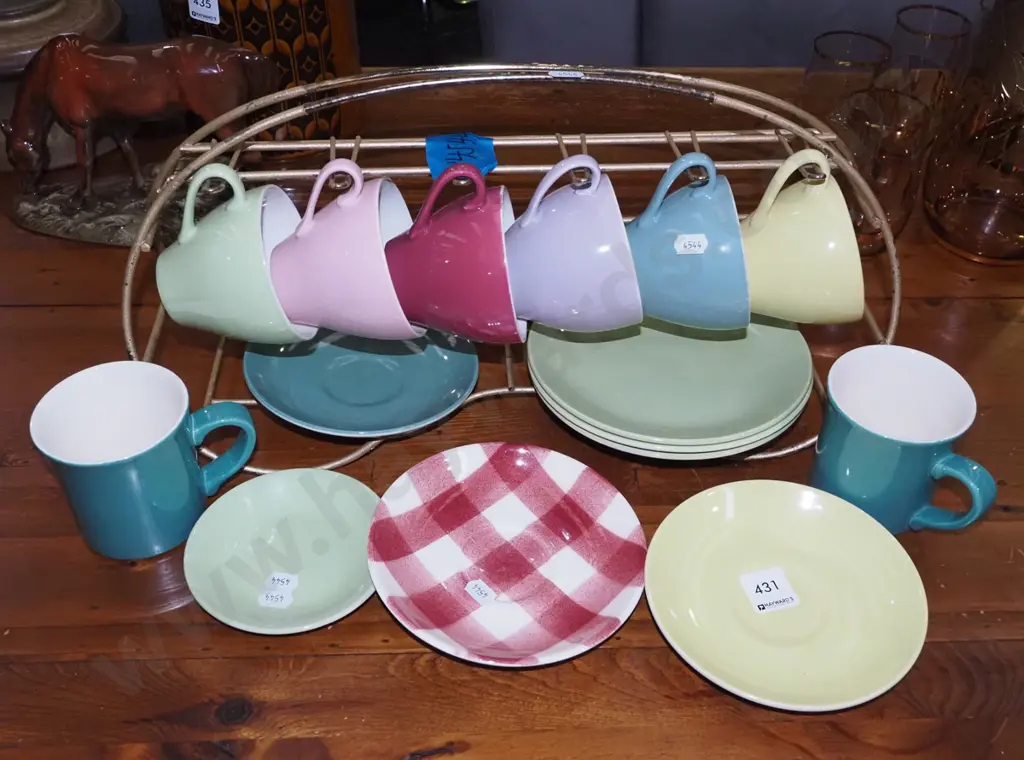 Crown Lynn cups, saucers, plates on retro wire rack Image 1++
