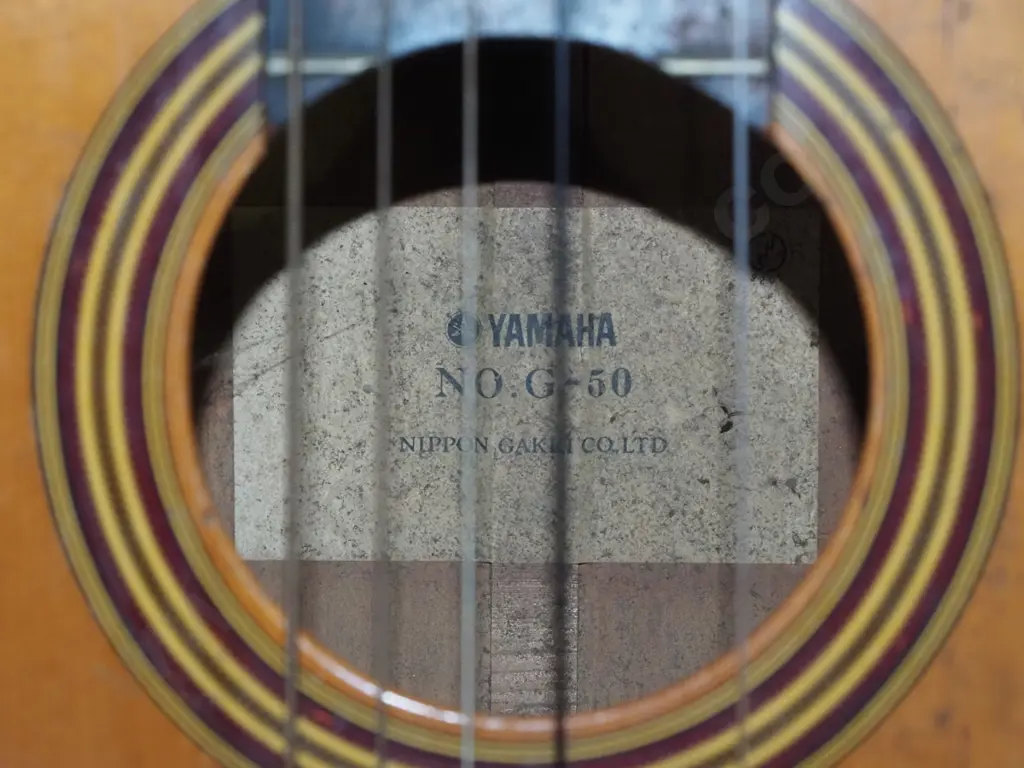 beaten Yamaha acoustic guitar Image 1++