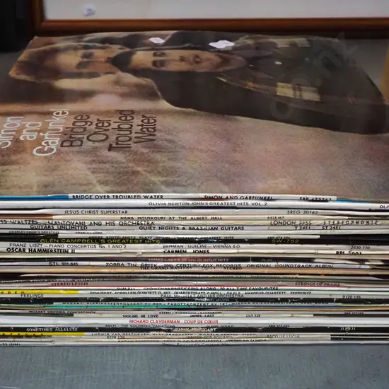 stack of LPs; Simon and Garfunkel etc