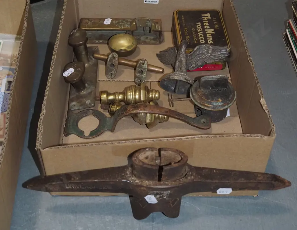 box; pick axe head, cast eagle bonnet ornament, tobacco tins etc Image 1++