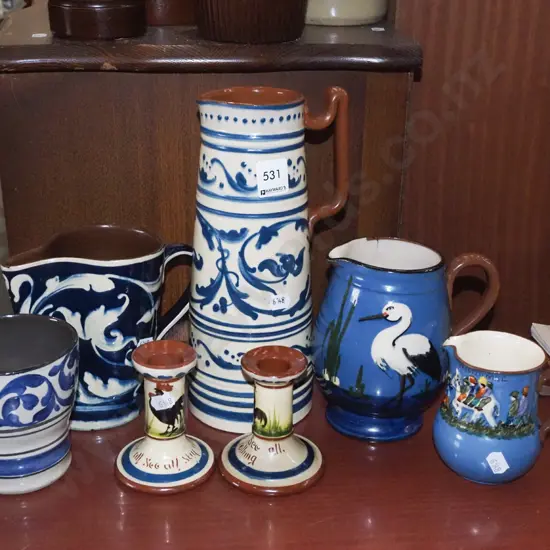 Torquay ware jugs, candlestick holders etc