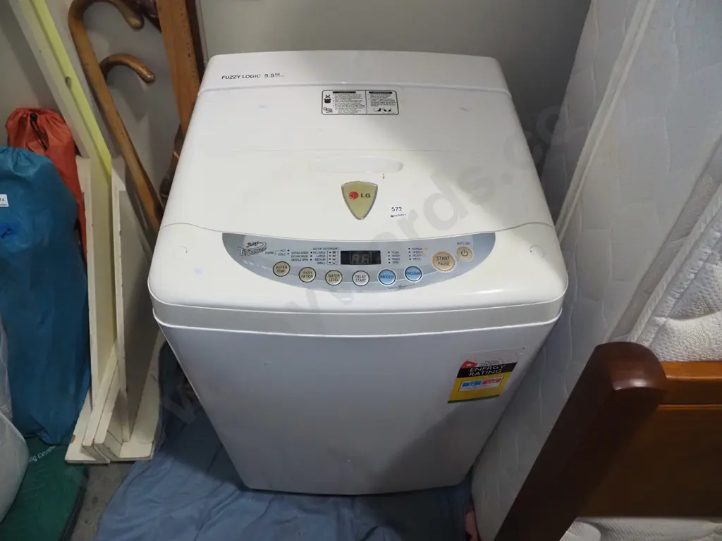 LG 5.5kg Fuzzi Logic top load washing machine Image 1++