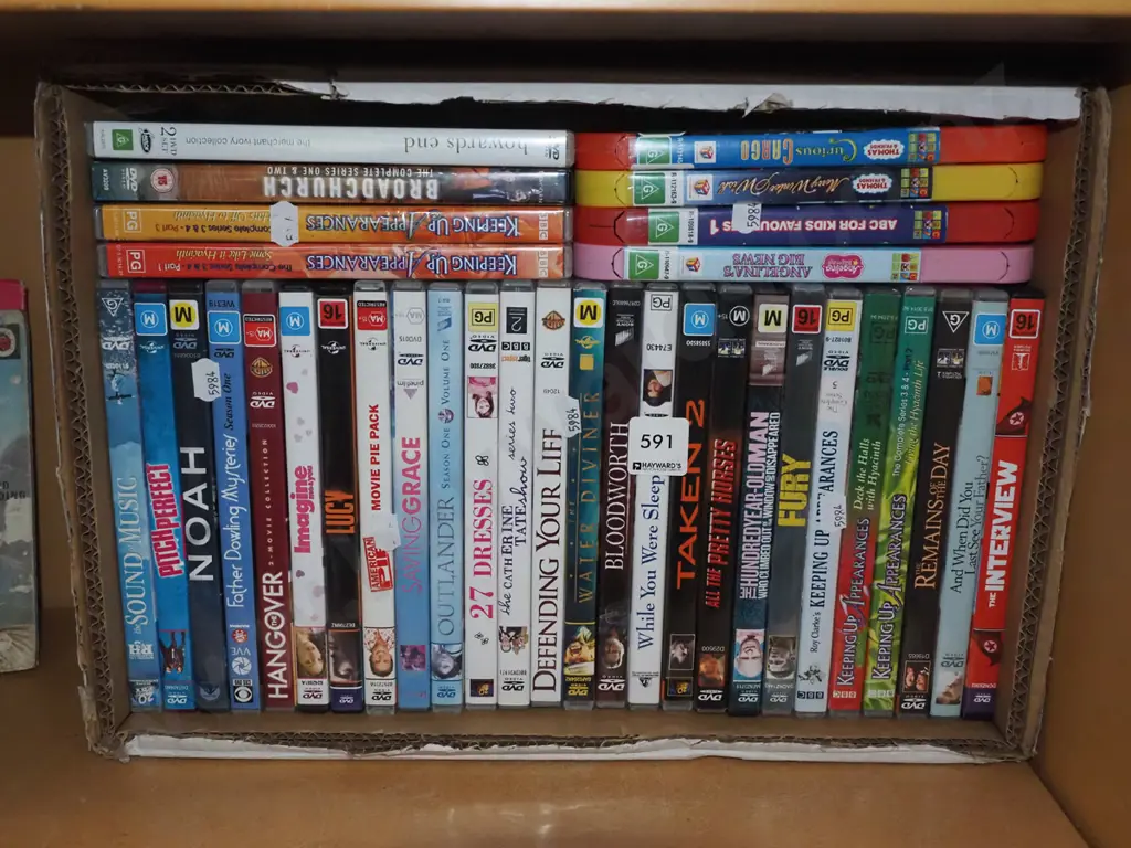 box of DVDs Image 1++