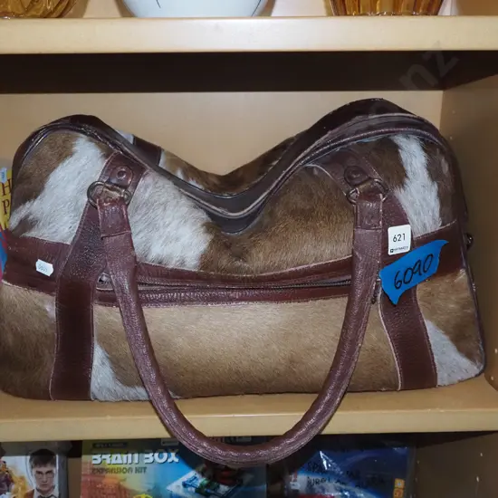 animal skin and leather holdall